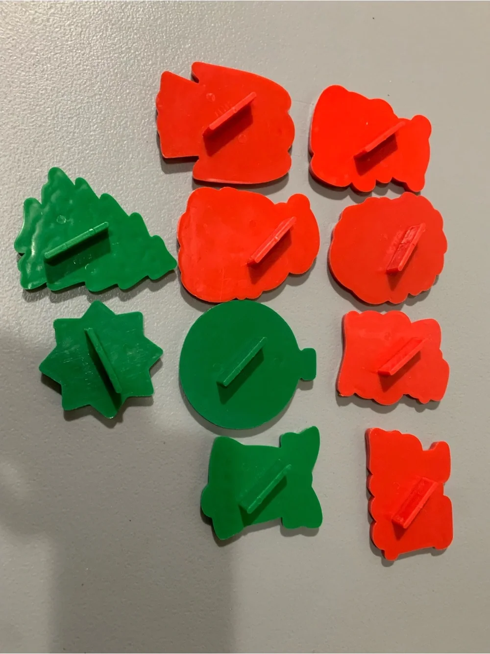 Clear Plastic Jar with Red and Green Holiday Game Pieces
